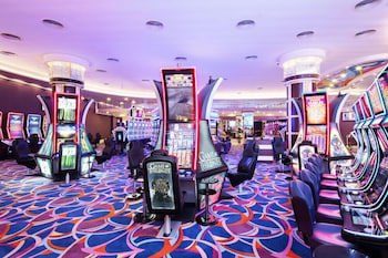 Slot machines in a bright gaming room